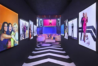 A tunnel-like entryway displaying photos of reality TV personalities led the way to the space's main presentation. The hallway was created by the addition of an upper lounge area, which provided more guest seating.