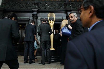 Marking the entrance to the event at the American Museum of Natural History was an oversize Clio Award statue. The annual ad industry ceremony drew hundreds to the Upper West Side site, including Ogilvy & Mather India's Piyush Pandey (pictured, second from right), who was honored with a lifetime achievement award.