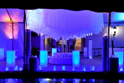 Chic and swanky chandelier with acrylic lit tables