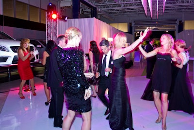 Following dinner, guests hit the dance floor. Organizers had one hour during dinner to give the reception area a nightclub feel for the after-party.