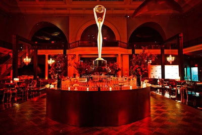 A custom fabricated bar, 15 feet in radius, stood in the middle of the room for the post-ceremony party, with an eye-catching 10-foot-tall Clio Award statue in the center.