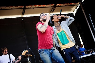 Maroon 5 and Wiz Khalifa headlined the InfieldFest, targeting a younger demographic.