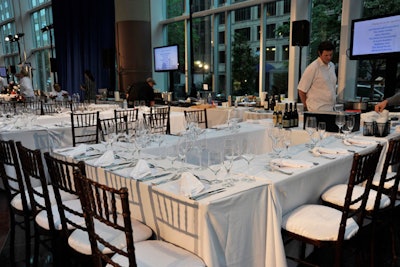 With eight more chefs participating than at last year's inaugural event, Chefs in the City moved to a new location, the atrium of the National Association of Home Builders' headquarters near Thomas Circle. Ten guests sat at each of the 20 tables, facing the chefs' workstations.