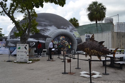 Situated near the entrance of the village and by the vendor and accreditation areas was a tent where attendees could learn about ocean conservation.