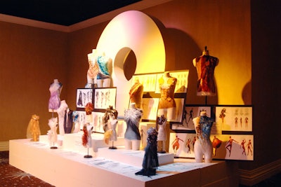 A display of the Cirque Du Soleil student design project set up in the cocktail reception area showed original sketches, materials, beading, sequins, and other findings used in the design and creation of the costumes.