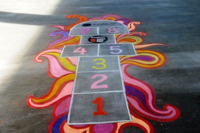 Family-friendly games included corn hole, bocce ball, ping pong, hopscotch, and a chalk-coloring area.