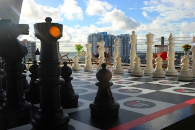 Adults and celebrities played chess with life-size pieces.