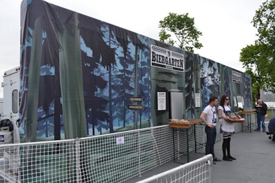 The Standard Hotel's Biergarten set up shop on the patio deck of Frieze, serving beer and pretzels. Staffers, clad in uniforms that were a spin-off of the standard black attire, provided table service, while a mini pop-up shop sold the limited-edition shirt. By housing it in the deck space, attendees could escape to the outside and then return without having to leave the fair.