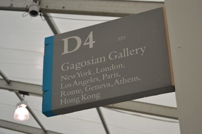 The exhibitor gallery signs, including that for first-time exhibitor the Gagosian Gallery, were made of a sturdy cardboard that was fully recyclable following its use.