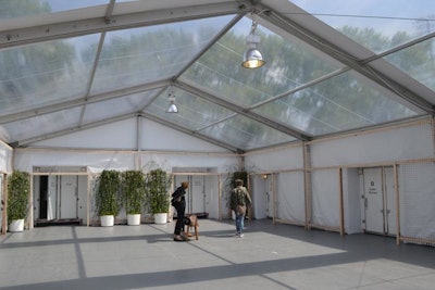 To keep the sculpture park on the west side of the fair grounds clutter-free and streamlined, bathrooms were accessible only from the east side of the tent. The tented spaces featured upgraded facilities beyond the standard lavatory, as well as a common center area decorated with plantings.