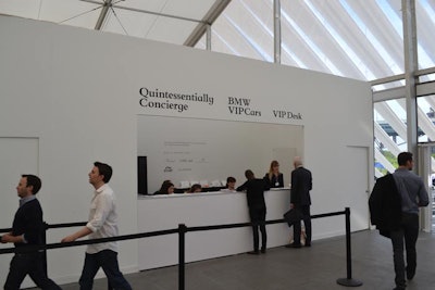 BMW's shuttle service, taxis, and private cars dropped off guests at the fair's south entrance, where a bank of concierge services was set up to assist visitors as they arrived. Also on-site was an Ozo Car kiosk, plus a 'cloakroom' coat check.