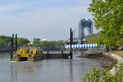 New York Water Taxi operated a special schedule of ferries to transport guests from Manhattan's Midtown East to the north entrance of Randall's Island Park. The cost of the 40-minute round-trip ride was part of the fair ticket.