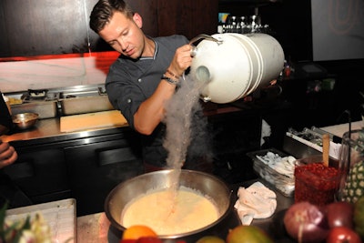 Chef Todd Erickson, known for innovative molecular gastronomy, creates liquid nitrogen bites such as Grey Goose ice cream treats.