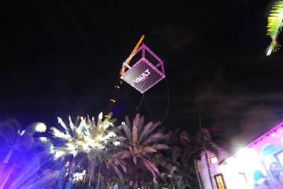 A boxing ring with a Vault logo dropped into the party with the help of a crane.