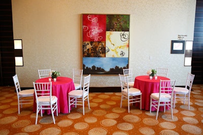 The color pink appeared throughout the event, including on linens that draped low tables guests sat at during cocktail hour.