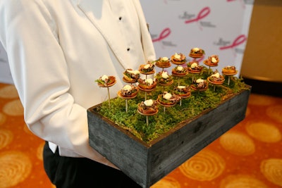 Staffers from the InterContinental Boston passed appetizers in ornate serving vessels.