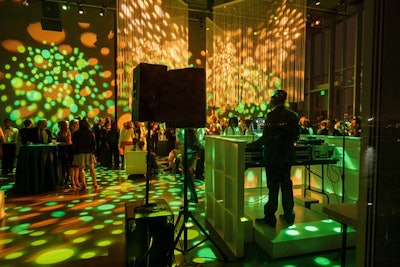 Frost's colorful, patterned lights swirled across the dance floor.