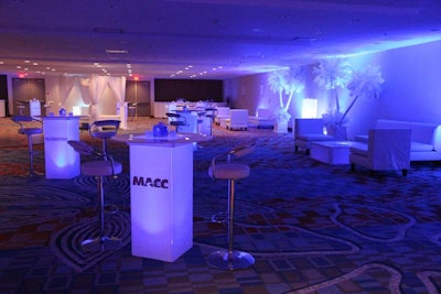Club MACC, a neon-blue bed lounge and techno club, was the final stop on the venue tour.