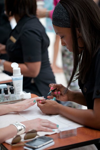 Networking breaks on the summit's second day took place in the cabanas near the pool. Each sponsor had its own cabana, and The Breakers featured a manicure station to promote its spa.