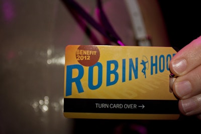 As guests checked into the Robin Hood Foundation's gala at the Javits Center, each received a custom ID tag, which this year was styled after MetroCards as a nod to the evening's subway motif. The cards enabled attendees to use the IML devices at their tables to make anonymous donations.