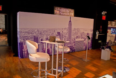 Title sponsor Yahoo touted its signature colors, white and purple, with a step-and-repeat depicting the New York skyline and white furnishings by design partner Design Within Reach. The space included subtle advertising for its new brand Genome, a custom audience buying company, which was announced Wednesday.