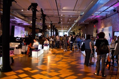 The 55,000-square-foot space, located on the second floor, was divided to include three stages for presentations, several lounges for participating companies, and plenty of guest seating.