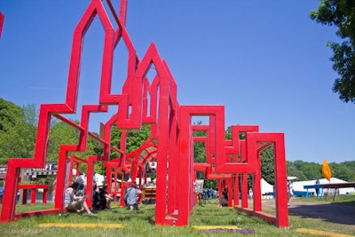 'Urbarn,' a structure designed through a partnership of the Great GoogaMooga, Rockwell Group, Just Food, and Pratt Institute students, stood at the center of the urban barn experience. The piece was designed as a visual representation of Just Food's mission statement to connect local farms with New York communities.