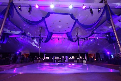 Blue draping and star gobos above the dance floor complemented the ceiling treatments of the dinner tent.