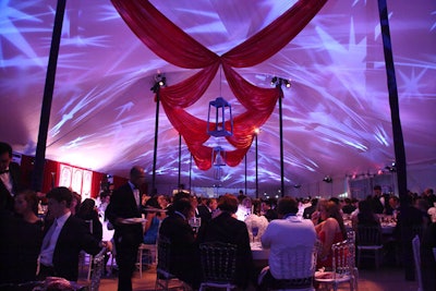 Red draping and star gobos adorned the ceiling of the dinner tent.