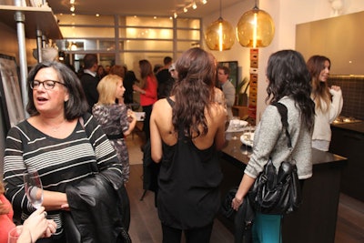 Guests mingled in a model unit that was set up inside the presentation space.