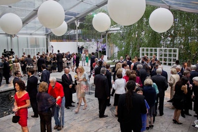 Prior to heading inside the museum for dinner, guests mingled in the garden for the reception. Passed bites by Glorious Food included petite chicken burritos dipped in salsa and guacamole, smoked salmon bruschetta, and parmesan crisps stuffed with tomatoes.