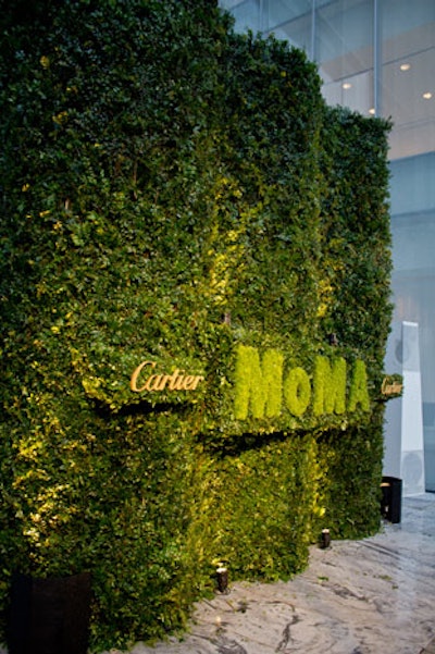 Similar to last year's event, organizers created a large topiary depicting the MoMA and Cartier logos to serve as the backdrop in the arrivals area.