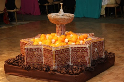 A scented fountain filled with oranges and candles spruced up the dance floor, where the Stu Hirsch Orchestra played at the end of the evening.