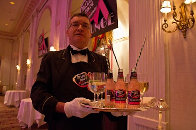 Even waitstaff were incorporated into the sponsor's setting, wearing black aprons with their typical black-tie outfits.