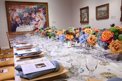 Jack Lucky incorporated many of the colors in the works of art in the galleries into the floral arrangements.