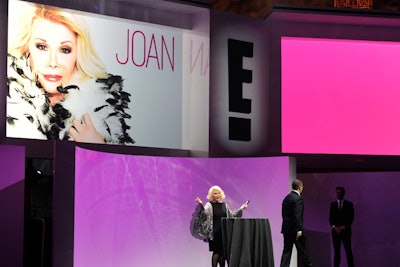 Fashion Police host Joan Rivers took the stage to announce the Friday-night show's extended hourlong segments. The comedian's remarks, which she made with handheld notes rather than a teleprompter, were perhaps the most entertaining of the night.