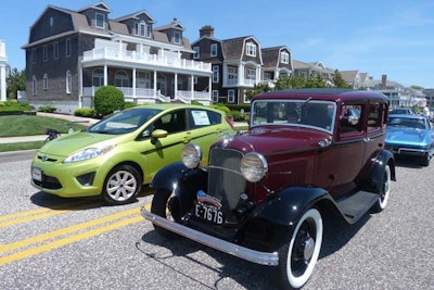 The tour event in Cape May, N.J., was part of Race at the Cape, a historical recreation of famous beach races between Henry Ford and Louis Chevrolet. Ford's fuel-efficient vehicles were on display next to antique cars to highlight how automotive technology has advanced since the original races in the early 1900s.