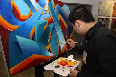 In the gallery, students created artwork live in front of guests.