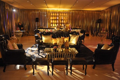 Golden drapes lined the wall of the after-party, and Kehoe grouped glossy black furniture into lounge vignettes.