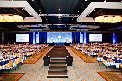An 8- by 64-foot runway filled the center of the ballroom at the Waldorf Astoria Orlando.