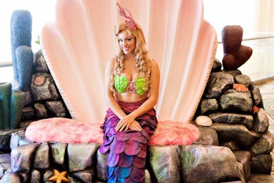 Sponsor SeaWorld Orlando brought a mermaid to greet guests in the foyer at the Waldorf Astoria Orlando. The park also brought penguins, stingrays, and small mammals to entertain attendees.