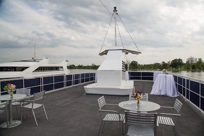 Upstairs, 200 guests can take in views from the ship's revamped outdoor observation deck, which now includes a full bar.