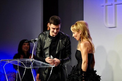 Designer Sid Neigum won this year's New Labels competition. Suzanne Rogers, the honourary gala event chair, presented Neigum with the award on the V.I.P. runway. The prize includes a fashion spread in Flare magazine, a design studio at T.F.I., and $25,000.