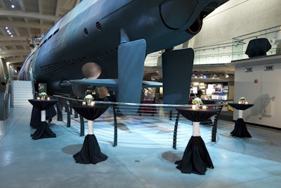 U505 Exhibit: cocktail tables around the submarine