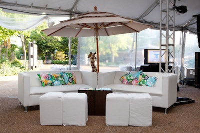 Aiming for a South Beach look, planners created white lounge areas with rentals from Tigerlily Events at the Lincoln Park Zoo. Lilly Pulitzer was a sponsor, and its summery Chiquita Bonita print showed up in napkins and other colorful accents.