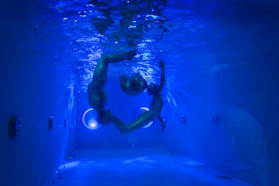 For Yahoo's Genome relaunch party in New York, organizers brought in a trio of synchronized swimmers from Gotham Synchro to swim in the venue's indoor pool. The water dancers sported alien-inspired body suits as a nod to the event's futuristic theme.