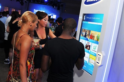 Through custom kiosks, consumers can download content—books, musics, apps, and news—for free. The freestanding stations were featured at the event and are part of the larger campaign for the phone's launch.