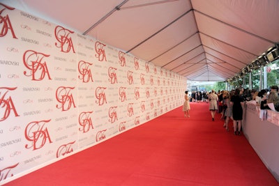 Eschewing the vibrant tones employed last year, the arrivals for the 2012 C.F.D.A. Awards at Alice Tully Hall returned to a classic red carpet with a more traditional step-and-repeat as its backdrop.