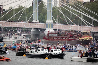 The Royal Barge (in rear, in red and gilt) and her cortege. But didn't it all seem rather ordinary—just a bunch of boats going really slowly together?