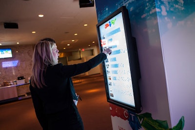 After the presentation, guests voted for their favourite new show on an interactive touch screen. Each vote added a bubble to a bar graph tracking the selections.